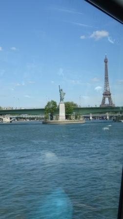 Eiffel Towr & Statue of Liberty fromSeine River Boat